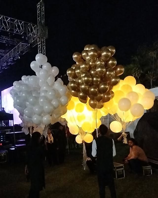 Creative balloon garland and stage setup for a kids party