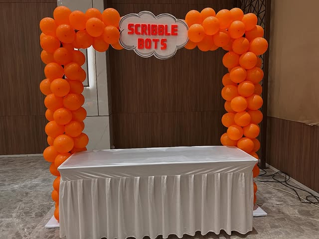 Balloon and floral décor for a festive party setup